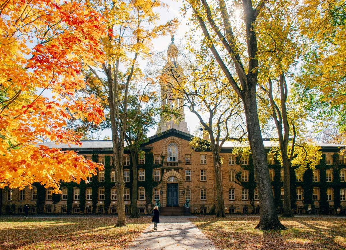 Princeton University in Fall A vibrant fall scene at Princeton University with colorful red, yellow, and orange foliage, highlighting the local service area for Princeton Elite Car Service